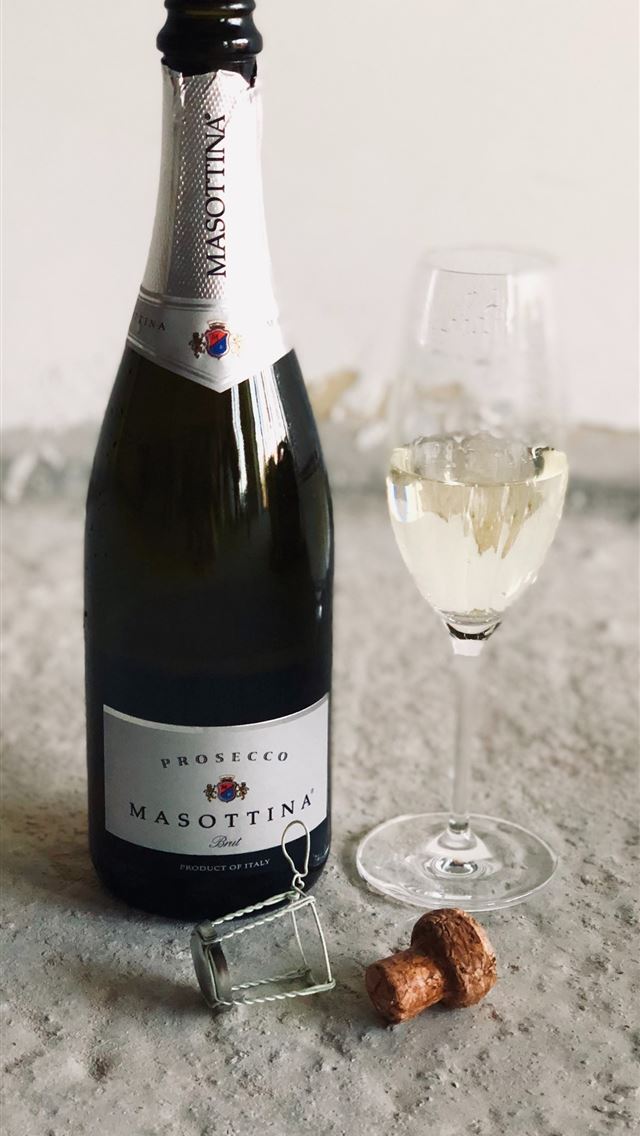 1284x2778 black champagne bottle beside champagne flute - netherlands iPhone Wallpaper