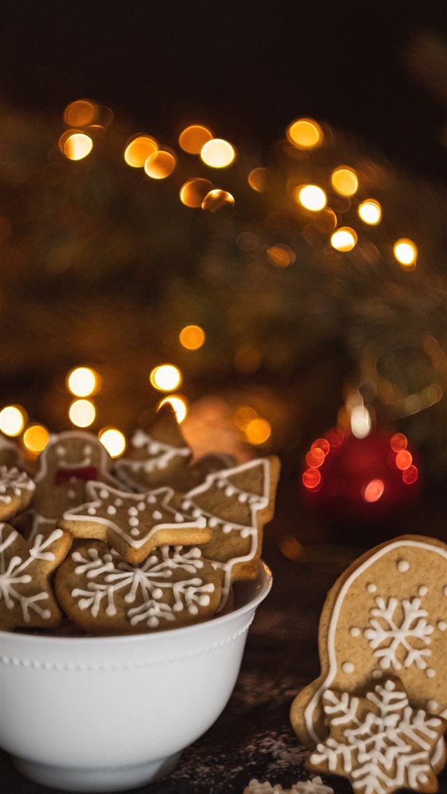 1284x2778 cookies in bowl near Christmas tree - holiday iPhone Wallpaper