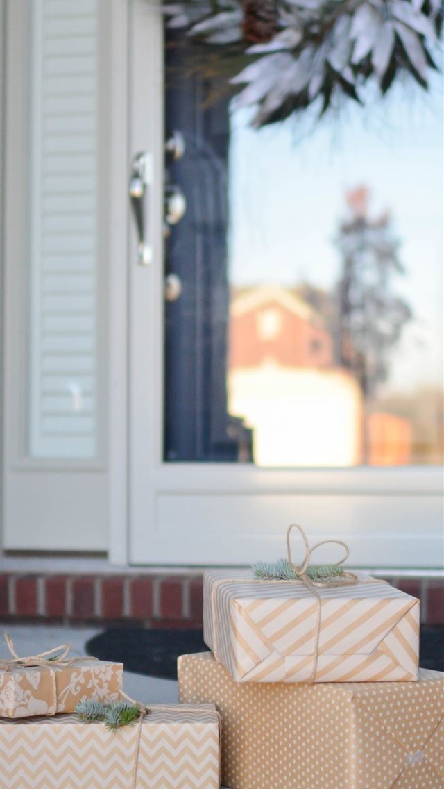 1284x2778 four brown gift boxes near white door - holiday iPhone Wallpaper