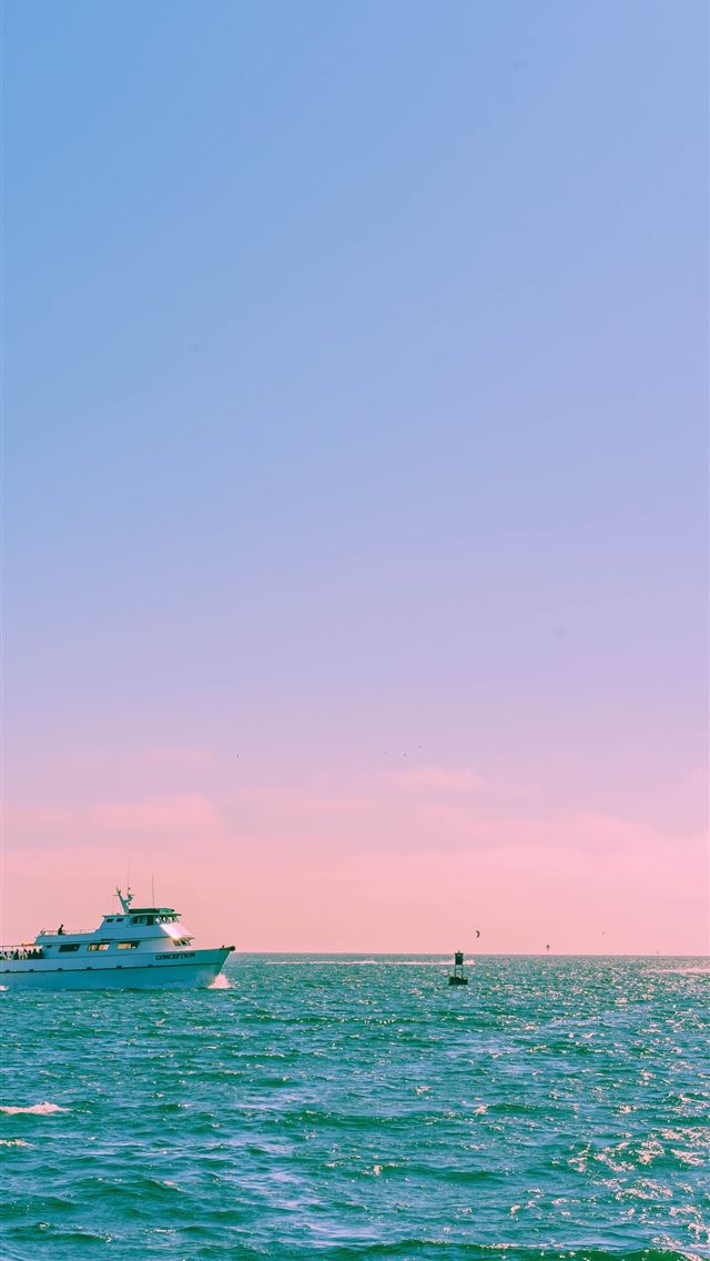 1284x2778 white yacht sailing during day - pink iPhone Wallpaper