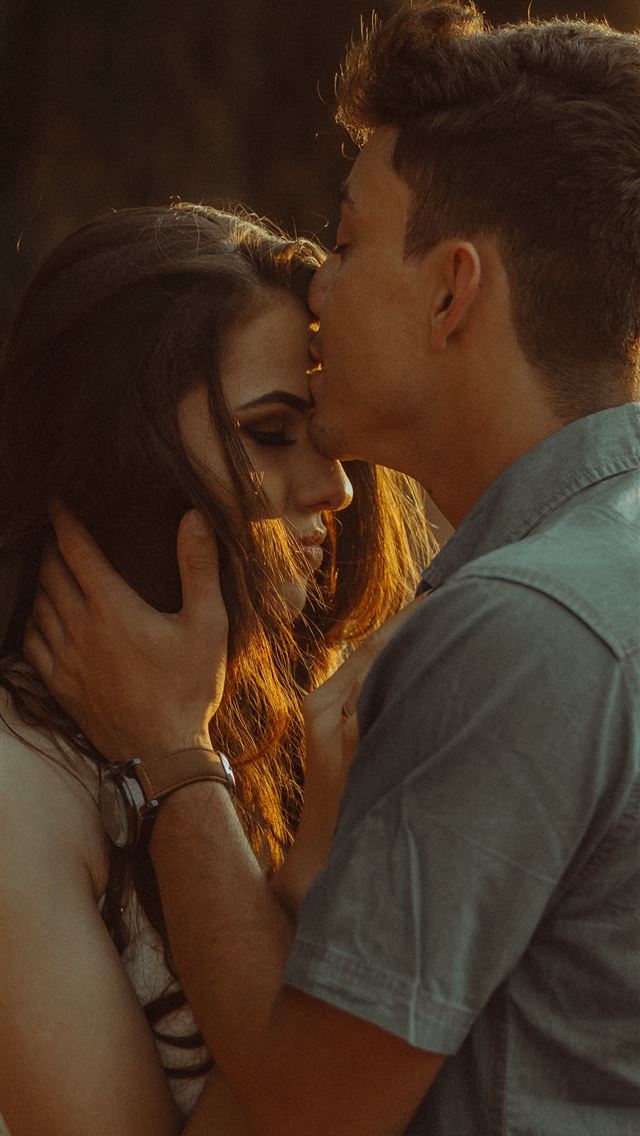 1284x2778 man kissing woman forehead - love iPhone Wallpaper