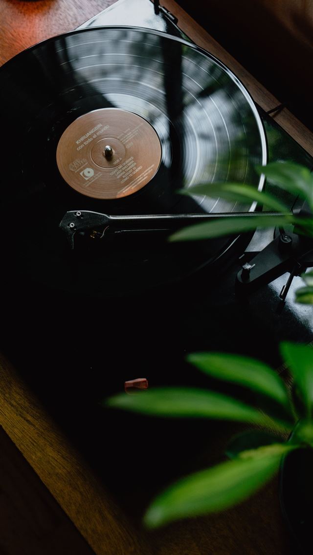 1284x2778 black turntable on brown wooden table - retro iPhone Wallpaper