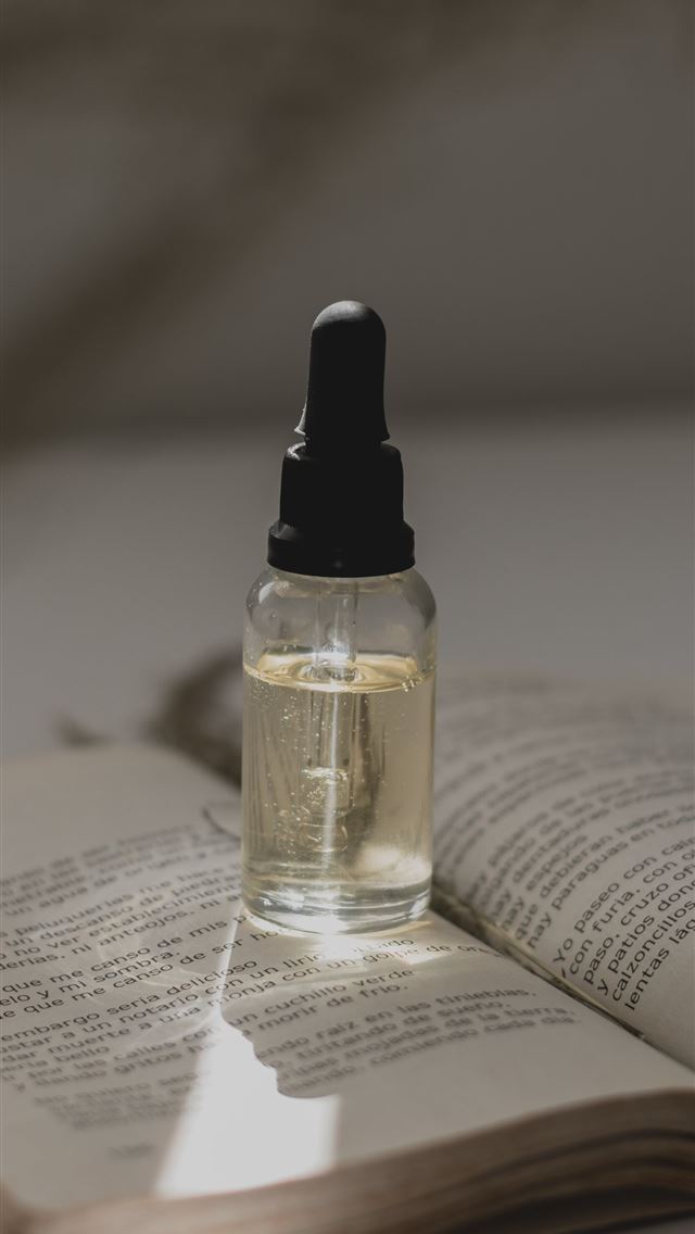 1284x2778 spray bottle on book - aesthetic iPhone Wallpaper