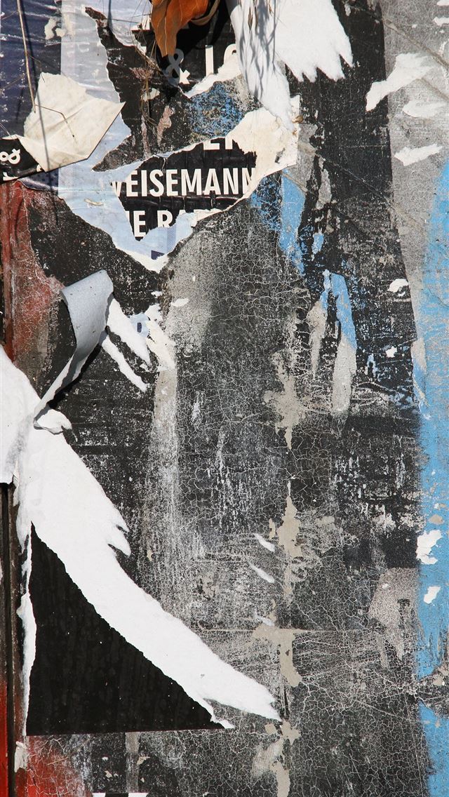 1284x2778 gray wall with flyers residues - germany iPhone Wallpaper