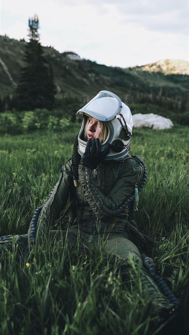 1284x2778 man in black jacket wearing white helmet sitting o... - space iPhone Wallpaper