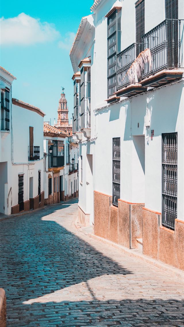 1284x2778 empty street between houses - spain iPhone Wallpaper