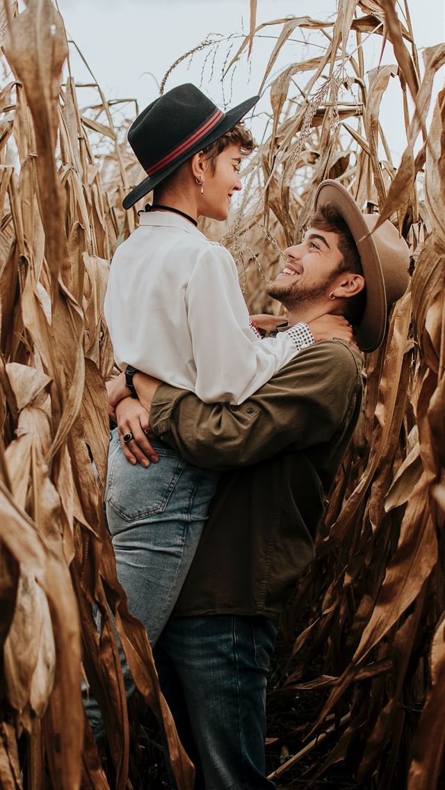 1284x2778 man hugging woman -  iPhone Wallpaper