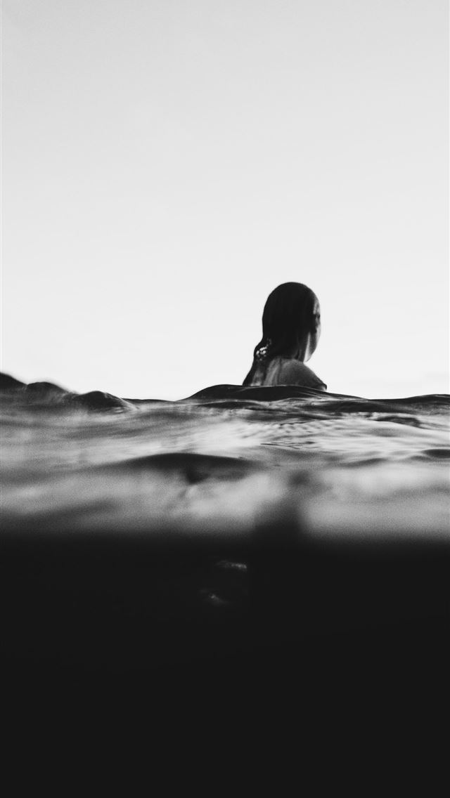1284x2778 woman on body of water - indonesia iPhone Wallpaper