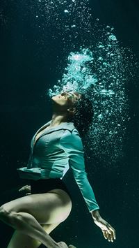 woman in black and white long sleeve dress wallpaper