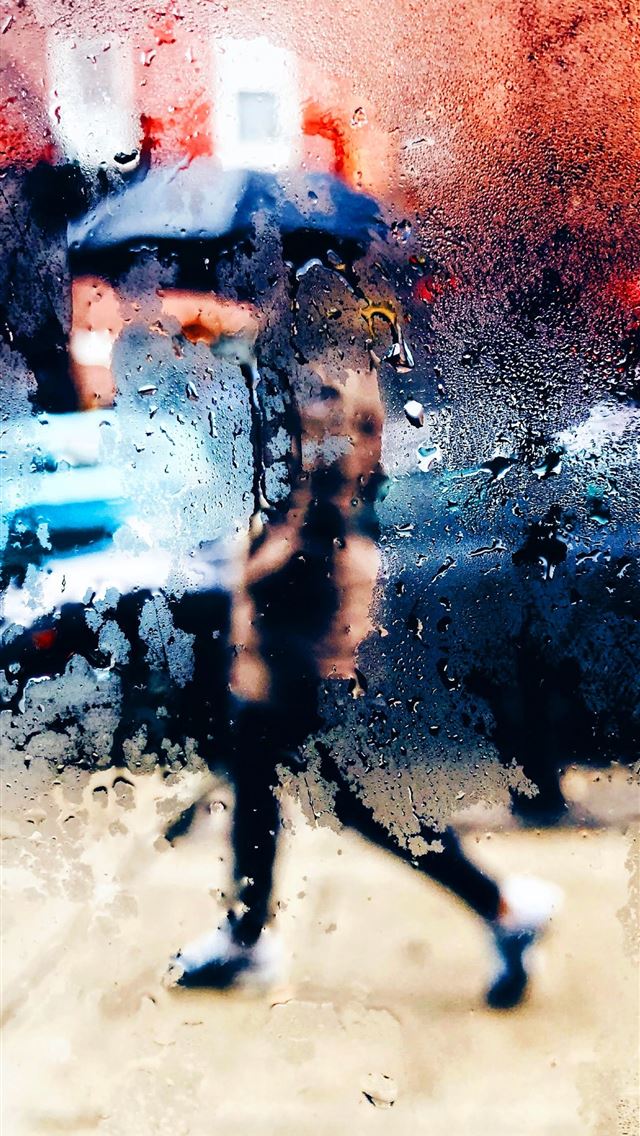 1284x2778 man walking on street -  iPhone Wallpaper