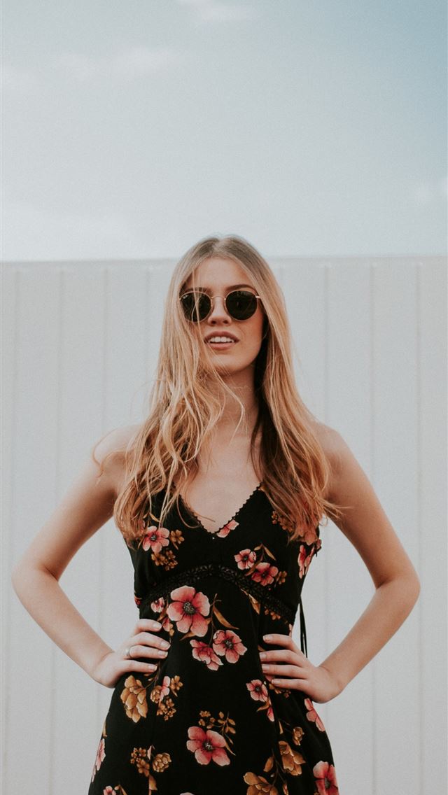 1284x2778 woman wearing black sunglasses standing near white... -  iPhone Wallpaper