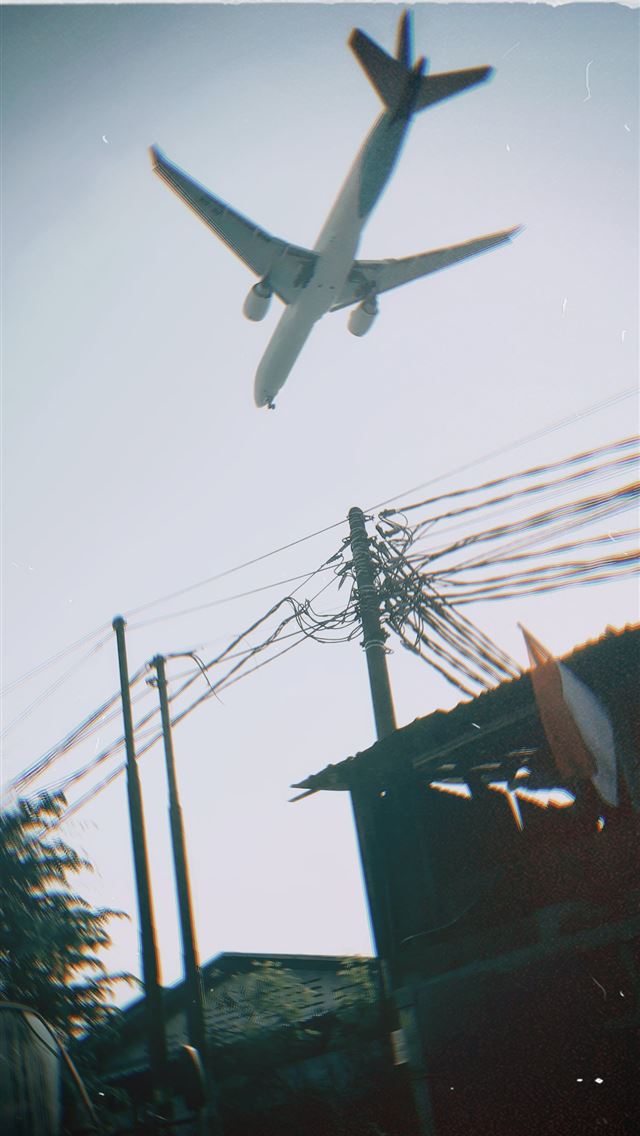 1284x2778 white airplane during daytiem - indonesia iPhone Wallpaper