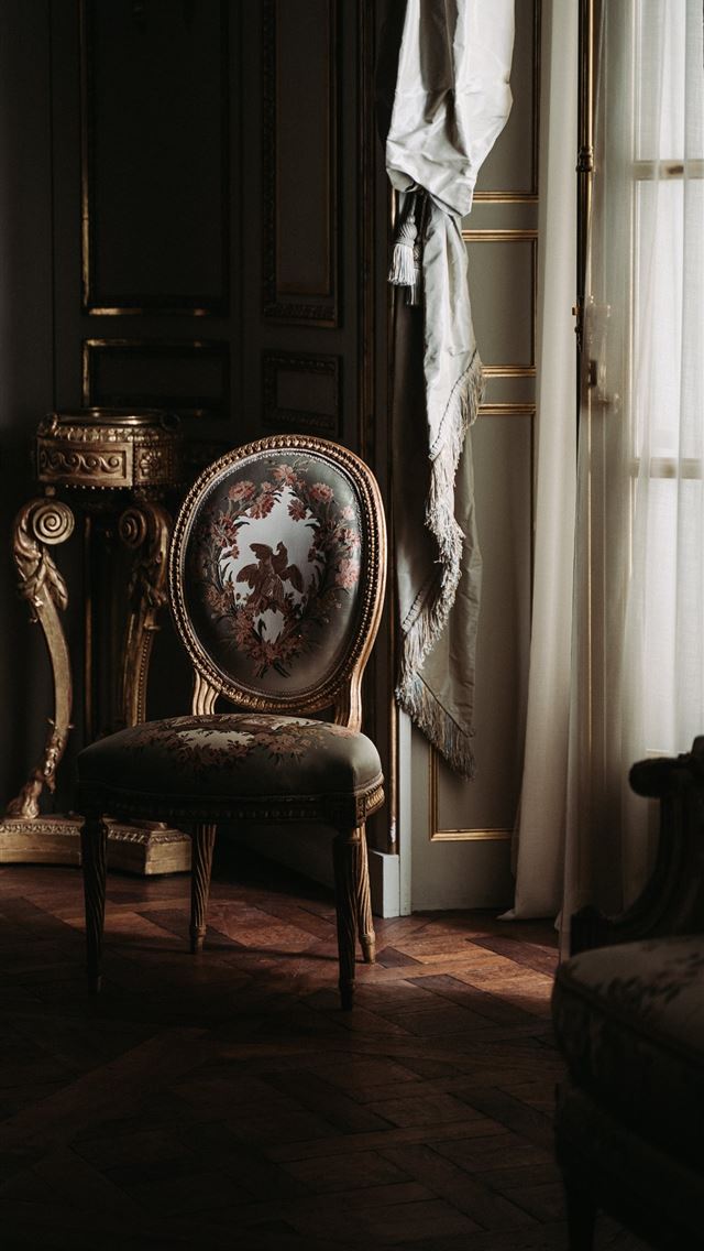 1284x2778 brown floral chair beside window -  iPhone Wallpaper