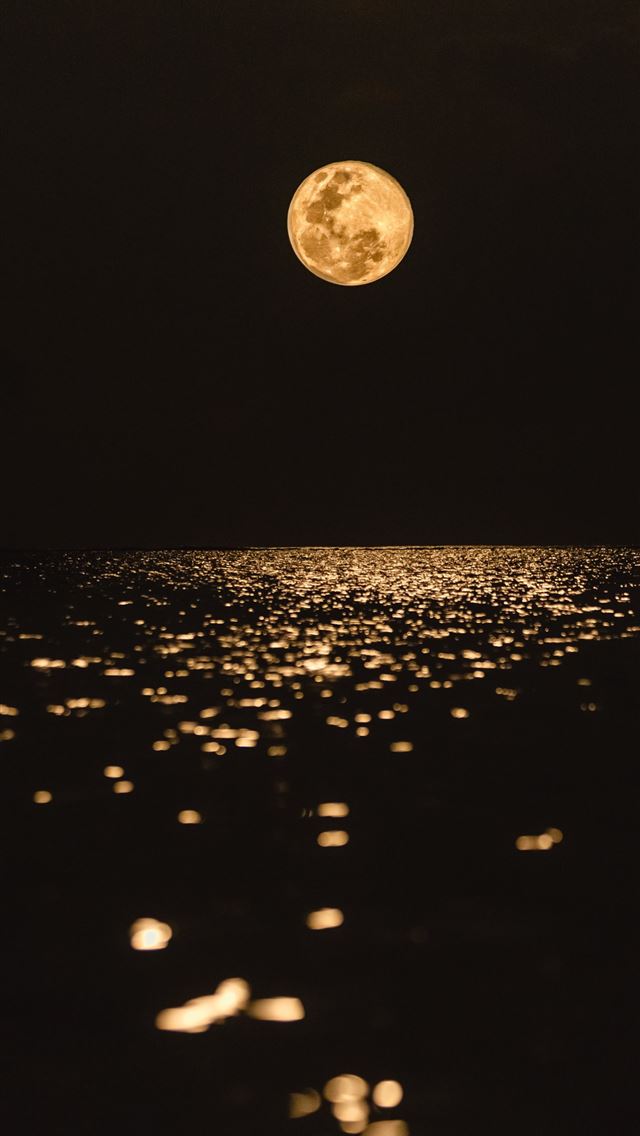 1284x2778 full moon over the body of water - outer space iPhone Wallpaper