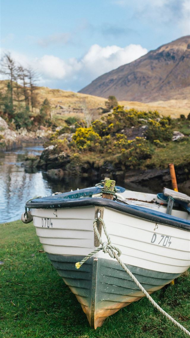 1284x2778 white boat near bodies of water - ireland iPhone Wallpaper