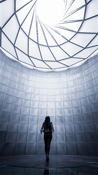 woman wearing black shirt facing the ceiling wallpaper