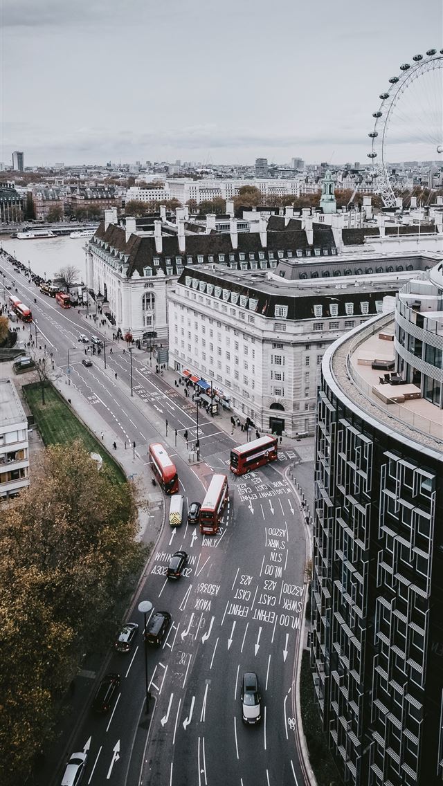 1284x2778 high angle photography of vehicles passing on stre... - united kingdom iPhone Wallpaper