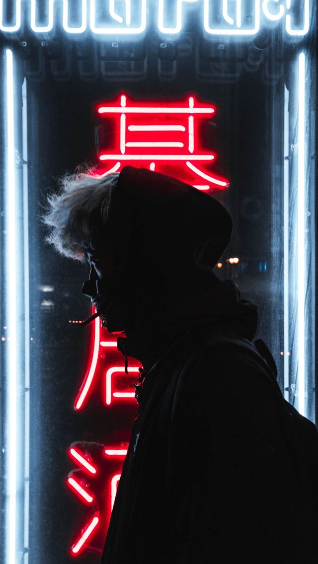 1284x2778 silhouette of person standing in front of neon sig... - minneapolis iPhone Wallpaper