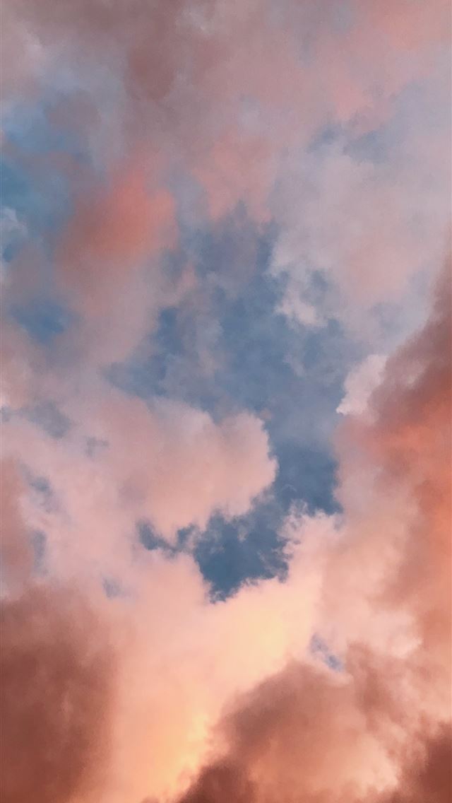 1284x2778 white clouds during golden hour - los angeles iPhone Wallpaper