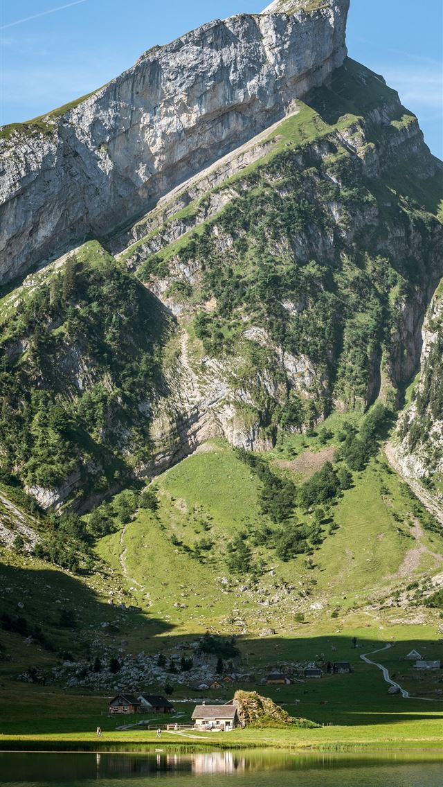 1284x2778 house on near body of water and mountain - landscape iPhone Wallpaper