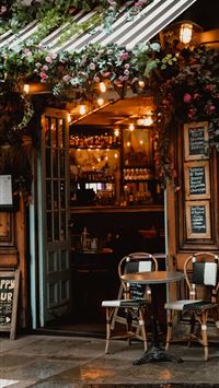 restaurant with lighted string lights wallpaper