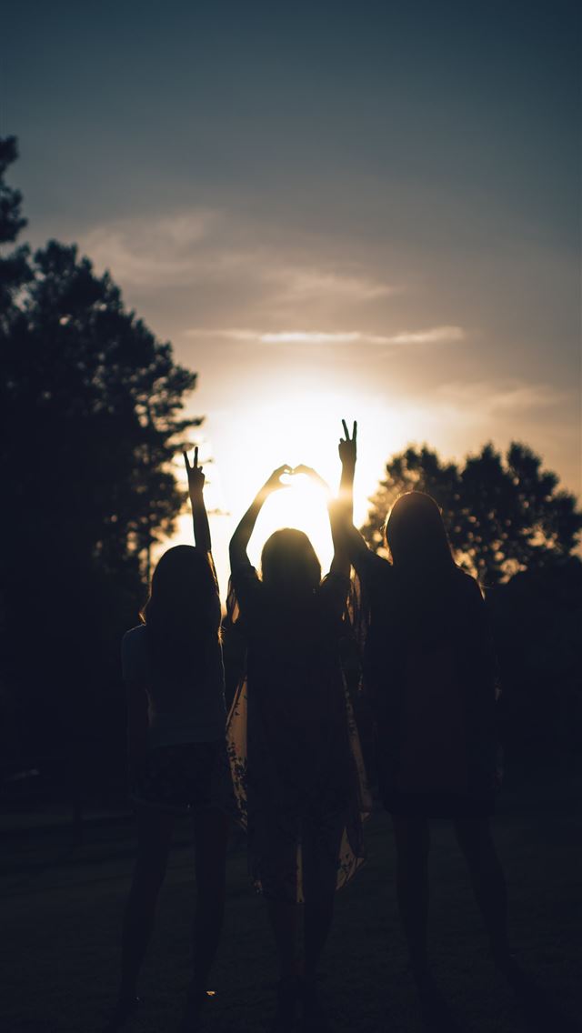 1284x2778 silhouette of three women during daytime -  iPhone Wallpaper