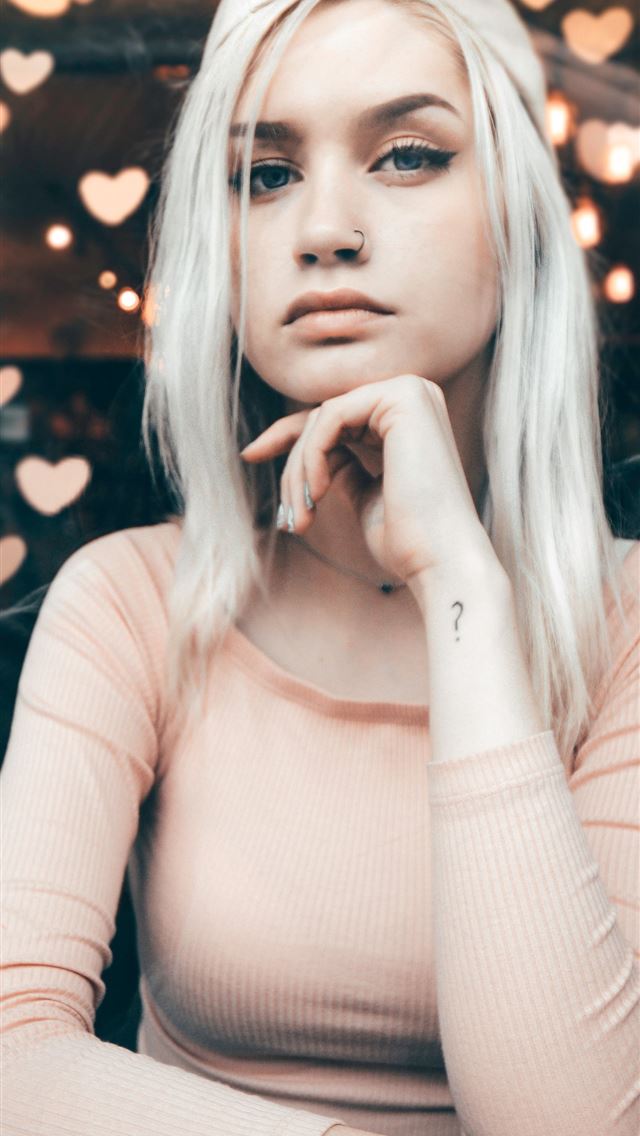 1284x2778 shallow focus photo of woman sitting on chair - canada iPhone Wallpaper
