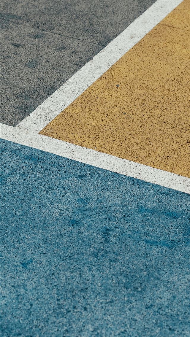 1284x2778 closeup gray yellow and blue painted pavement - yellow iPhone Wallpaper