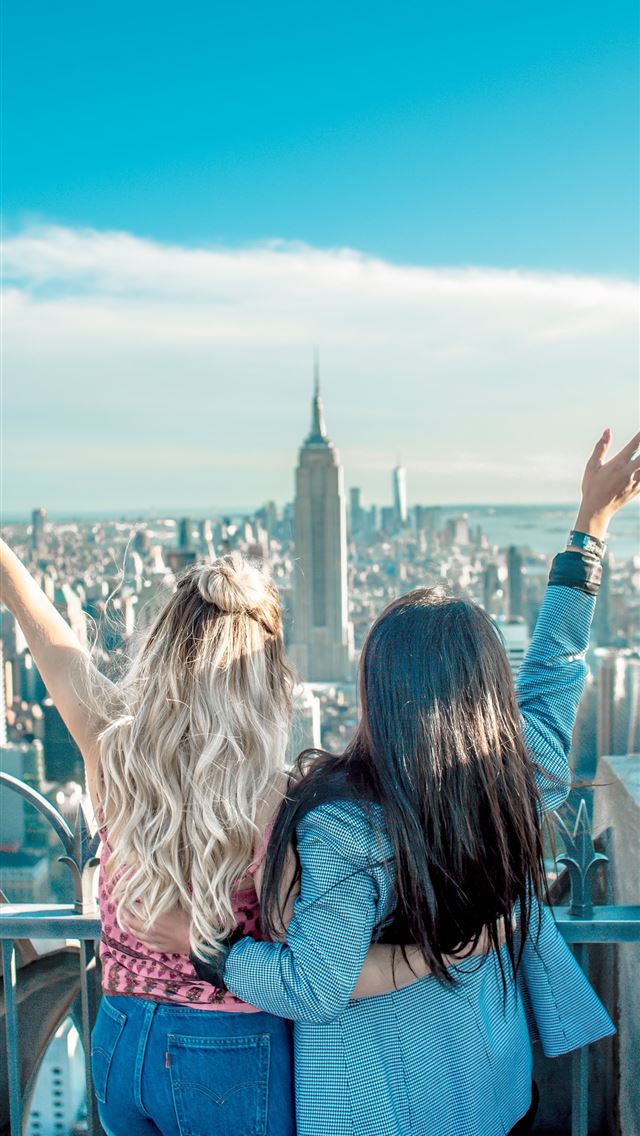 1284x2778 two women hands on their back while raising their ... - girl iPhone Wallpaper
