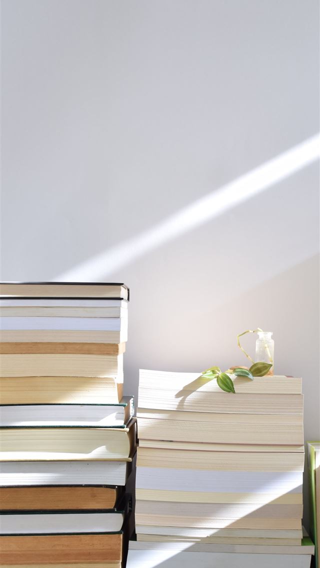 1284x2778 brown wooden chair beside white wooden desk - book iPhone Wallpaper