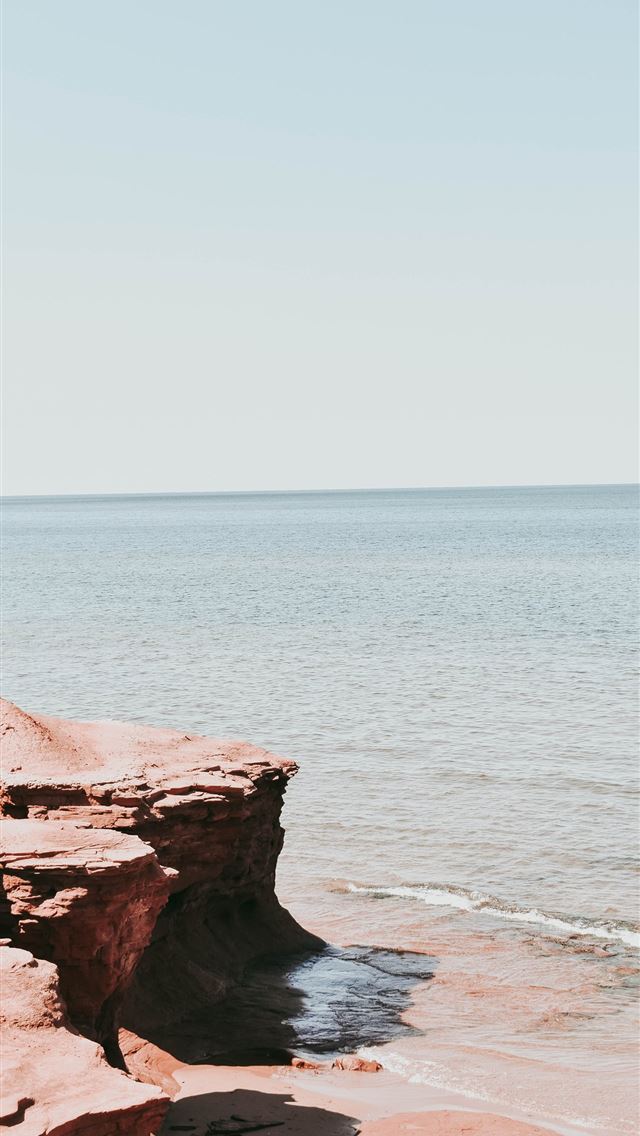 1284x2778 stone near in the sea - canada iPhone Wallpaper