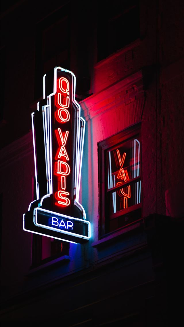 1284x2778 Quo Vadis bar lighted signage - bright iPhone Wallpaper