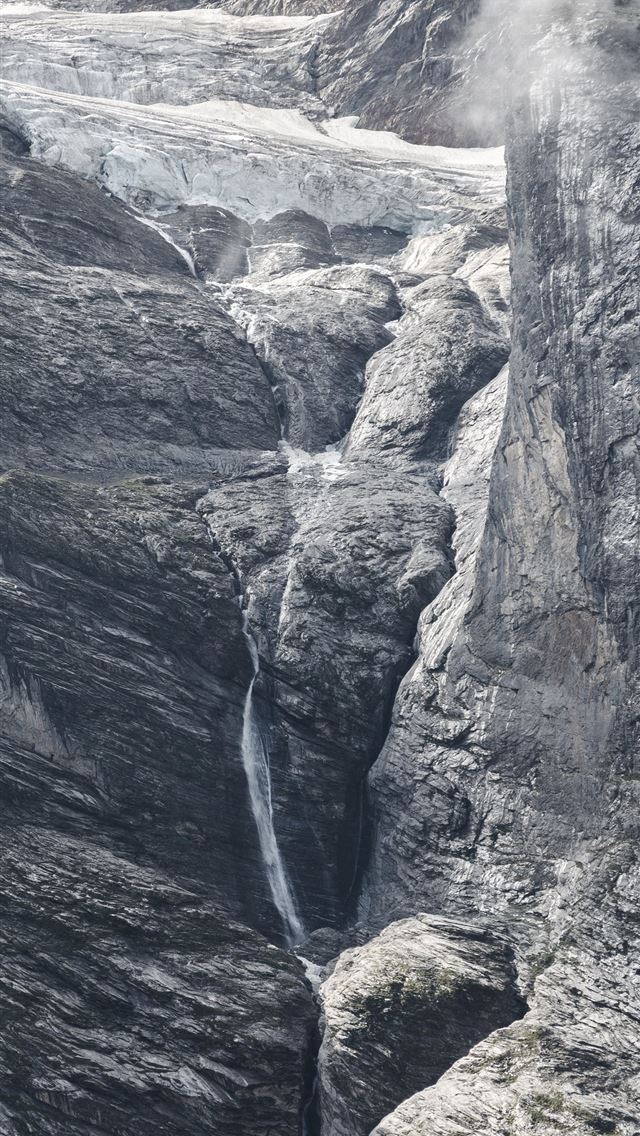 1284x2778 aerial photo of a waterfalls - switzerland iPhone Wallpaper