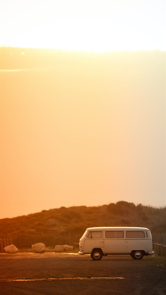 1284x2778 white van near on the fence - summer iPhone Wallpaper
