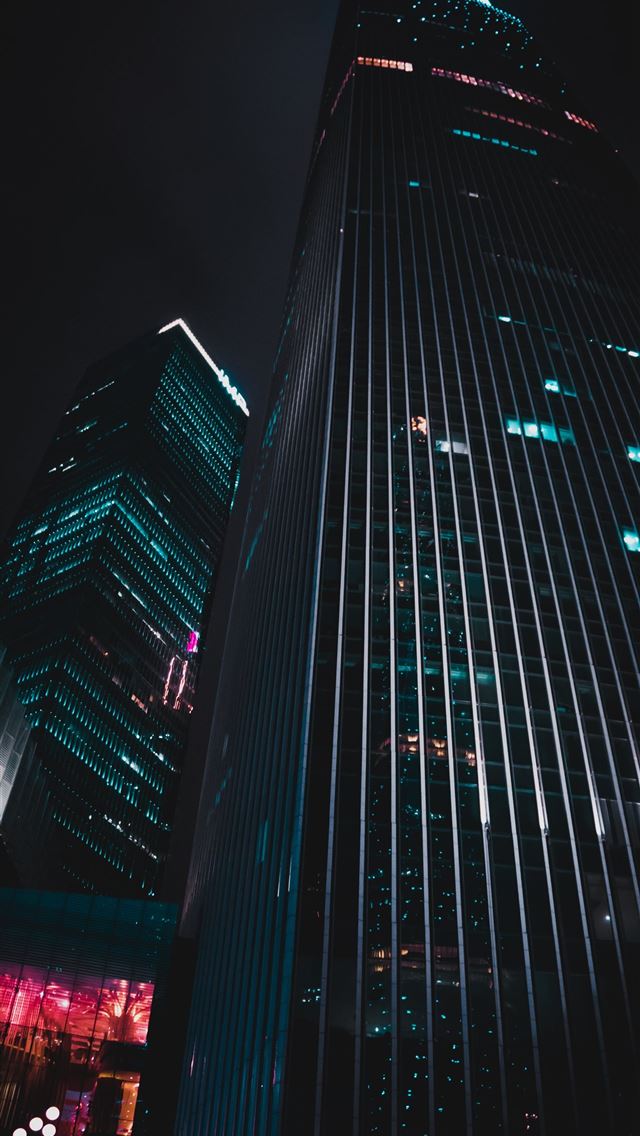 1284x2778 low angle photography of black high rise building - building iPhone Wallpaper