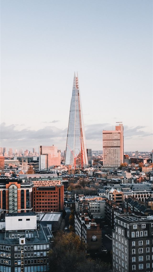 1284x2778 high rise building under white clouds during dayti... - united kingdom iPhone Wallpaper