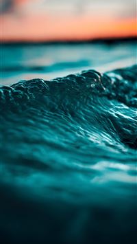 selective focus photo of water wave wallpaper