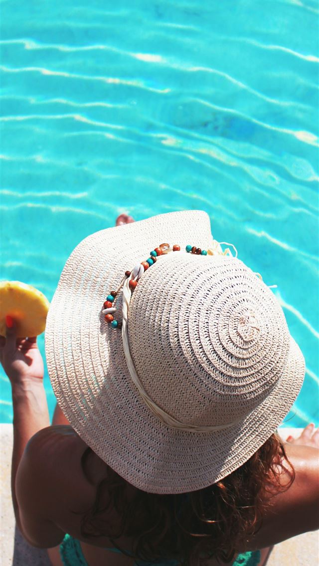 1284x2778 woman sitting beside swimming pool - summer iPhone Wallpaper