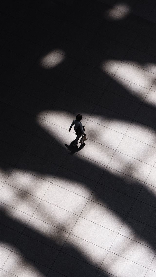 1284x2778 woman walking on white tiled flooring - japan iPhone Wallpaper