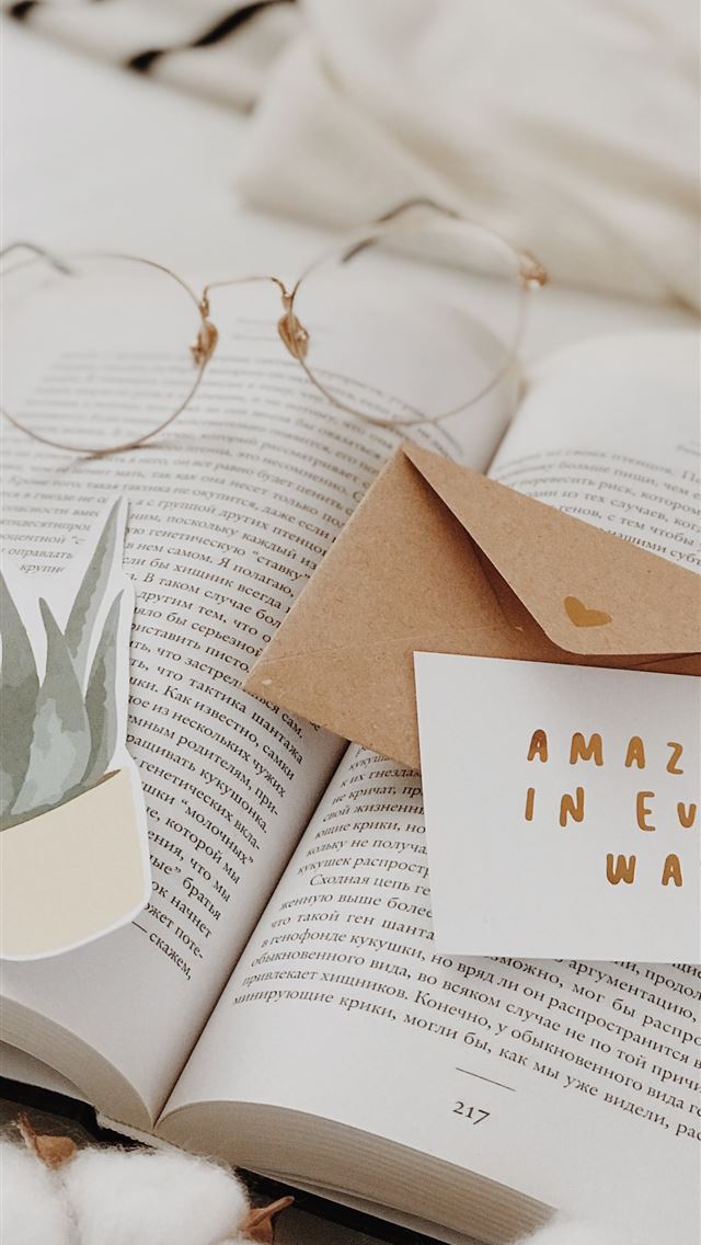 1284x2778 eyeglasses on book near envelope - quotes iPhone Wallpaper
