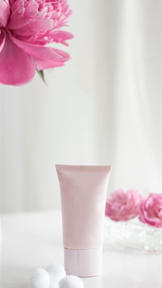 1284x2778 pink flower in white ceramic vase - europe iPhone Wallpaper