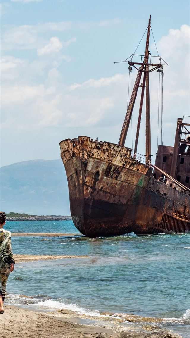 1284x2778 brown ship on shore - greece iPhone Wallpaper