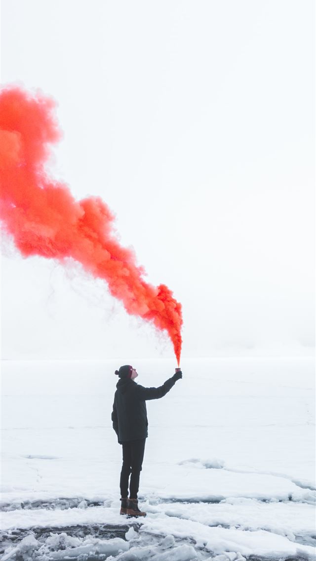 1284x2778 person wearing black jacket and holding red colore... - kandersteg iPhone Wallpaper