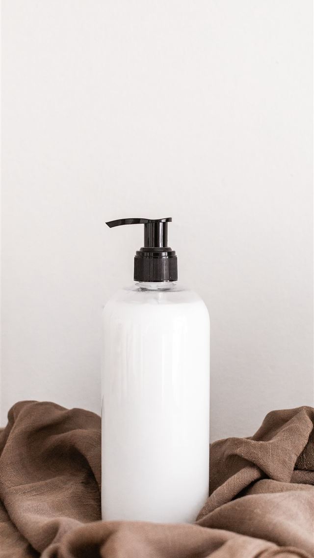 1284x2778 white plastic bottle on white table - south africa iPhone Wallpaper