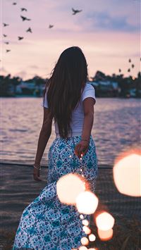 woman standing on green grass field in front body ... wallpaper