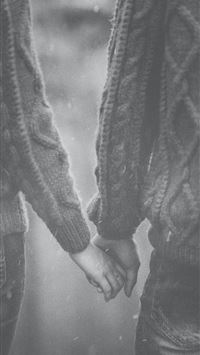 man and woman holding each others hands wallpaper