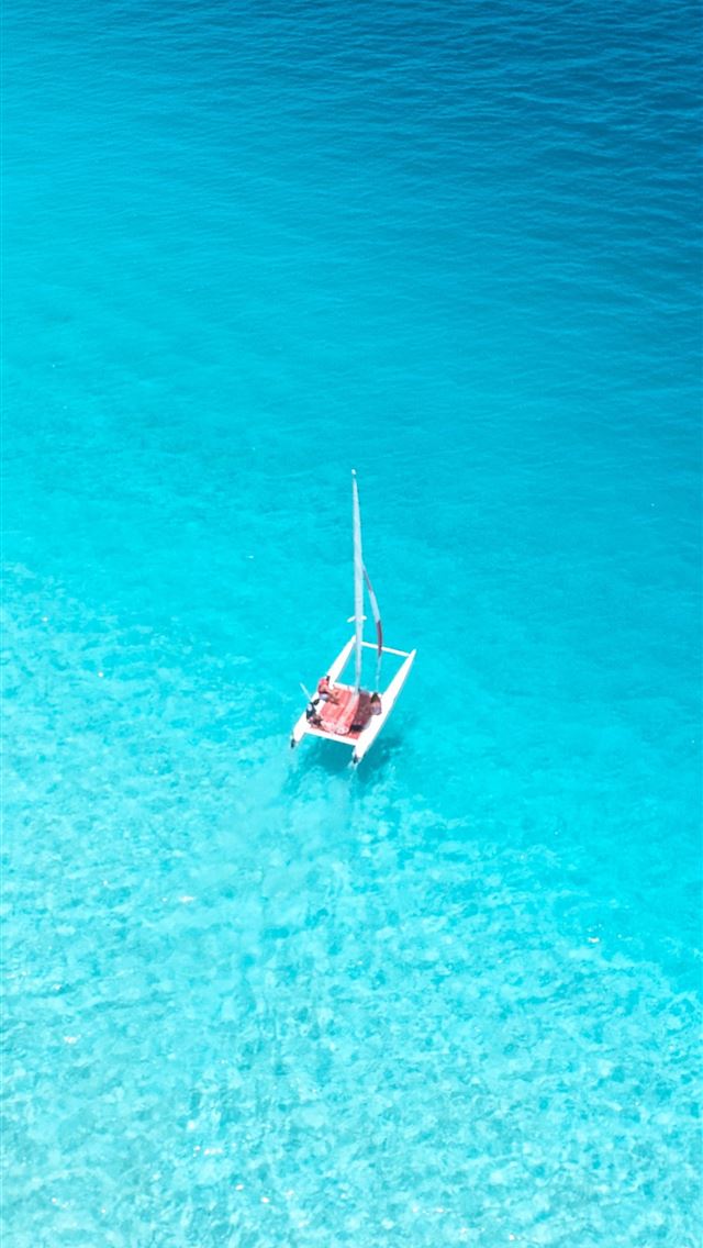 1284x2778 aerial view photography of sailboat on body of wat... - maldives iPhone Wallpaper