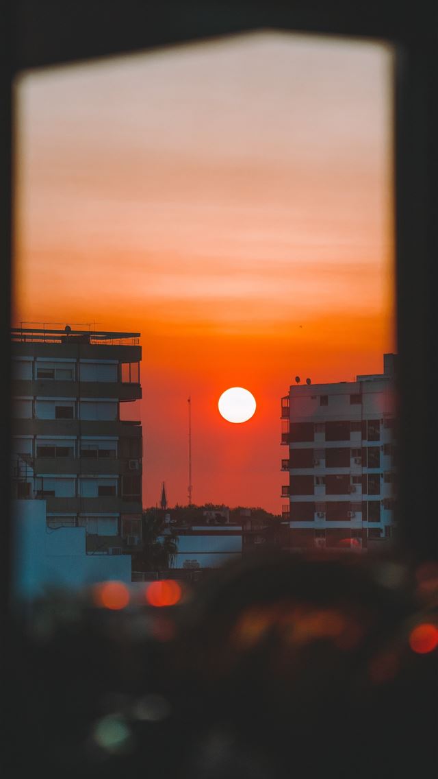 1290x2796 silhouette of city buildings during sunset - sunset iPhone Wallpaper