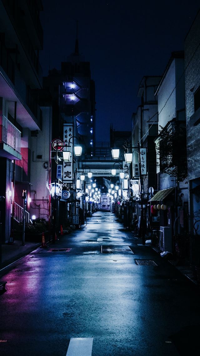 1290x2796 empty street with lighted lamps during night time - city iPhone Wallpaper