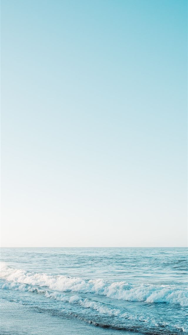 1290x2796 ocean waves under blue sky during daytime - beach iPhone Wallpaper